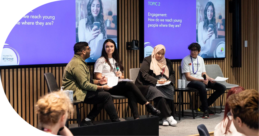 The Movement to Work team on stage at an event